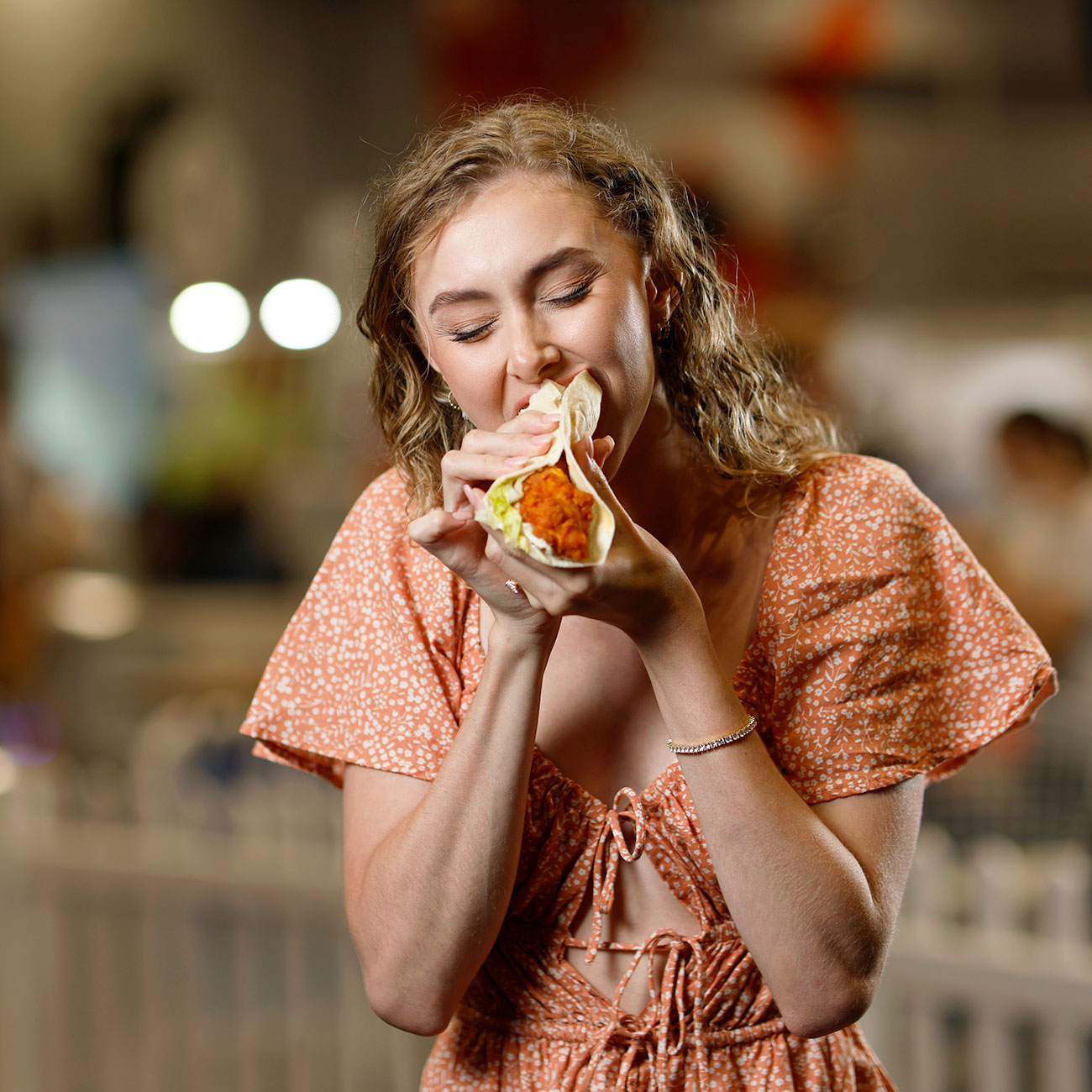 Woman enjoying a freshly made Roll during the show