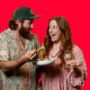 Couple enjoying noodles and wine at the Good Food & Wine Show Australia