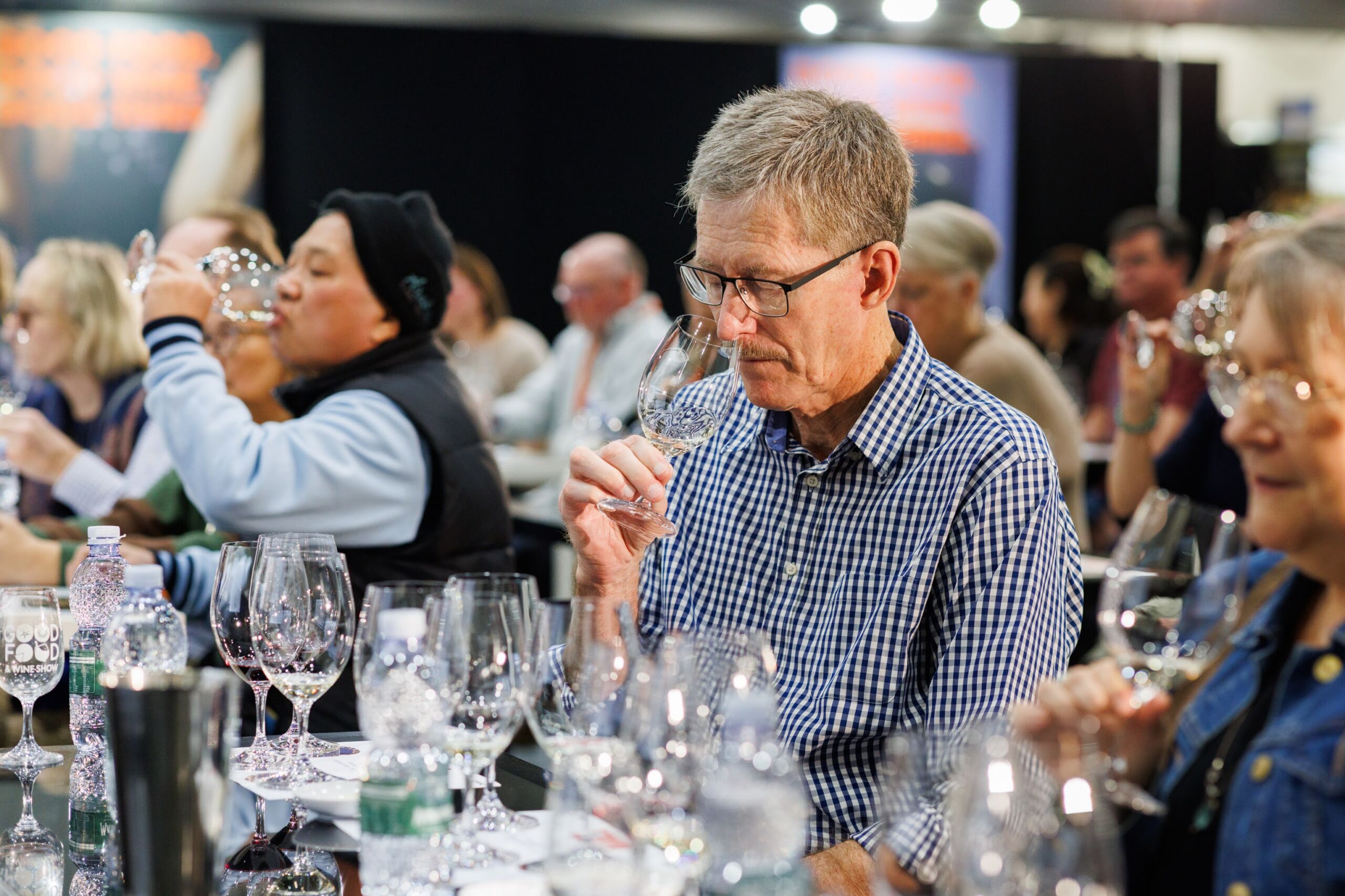 Man smelling and appreciating the aroma of wine during a Drinks Lab session at the Good Food & Wine Show.