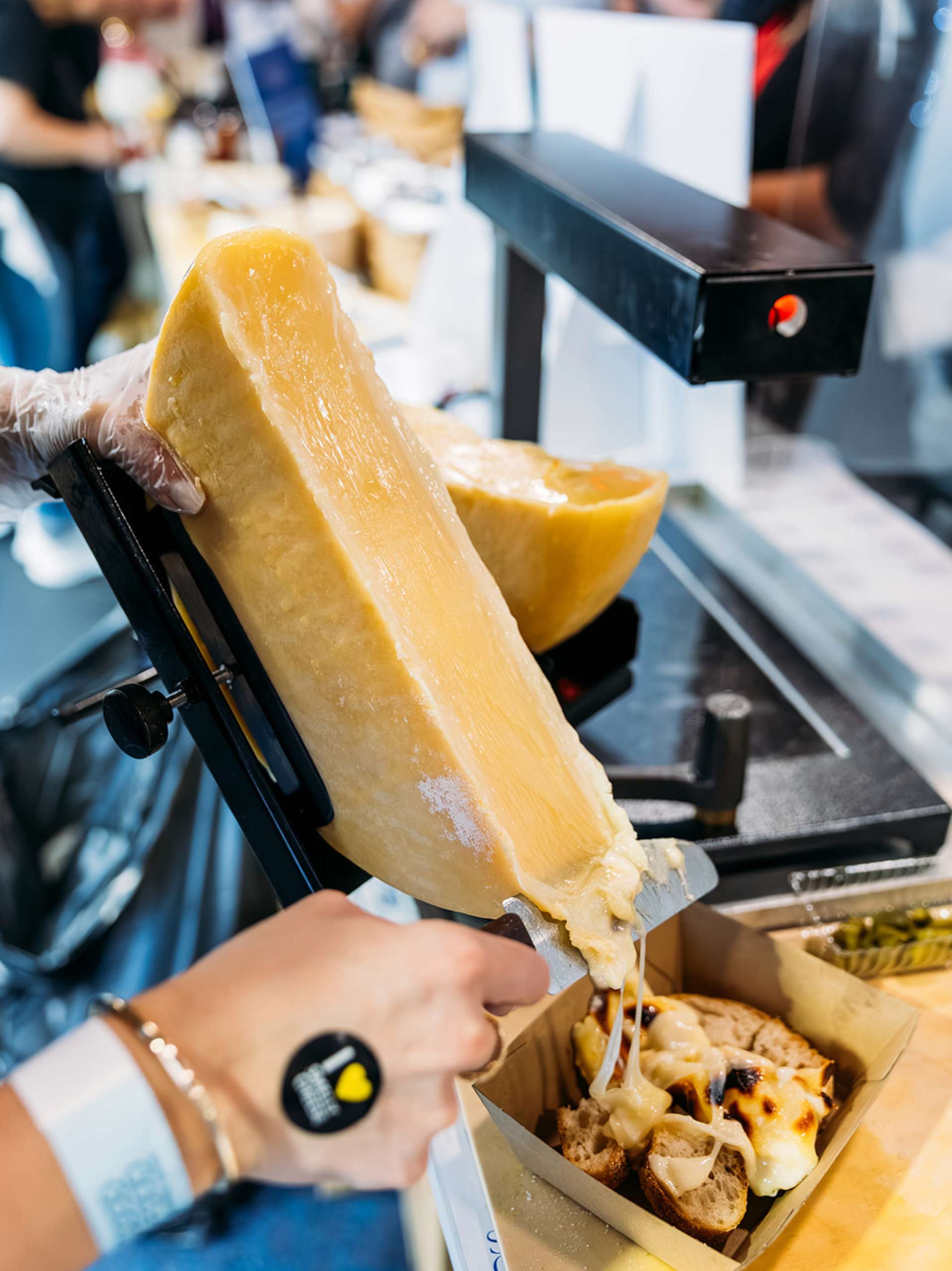 Melting cheese onto a toastie at the Good Food & Wine Show