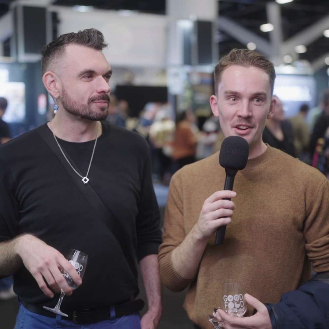 Two men being interviewed at the Good Food & Wine Show, smiling and enjoying the event.