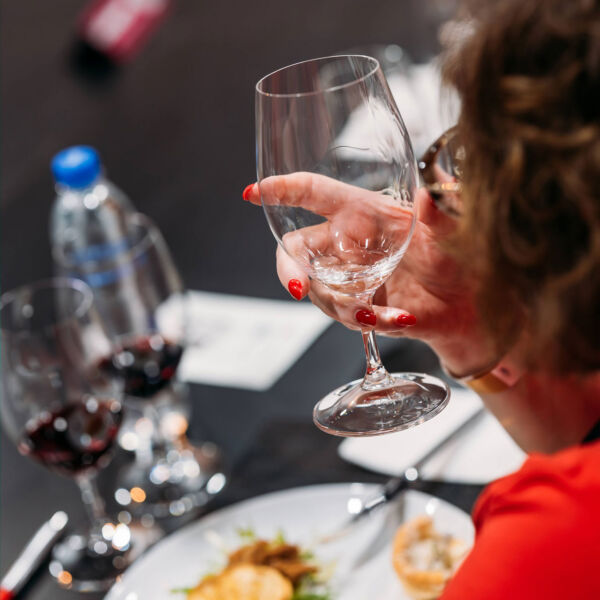 A Wine Selectors host guides guests through a curated wine tasting experience.