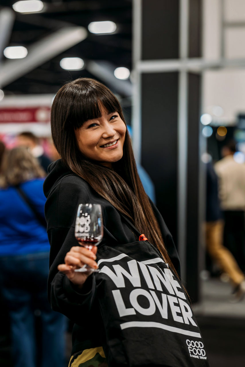 Woman holding a Wine Lovers Bag at the Good Food & Wine Show
