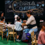 Kids and Parents at the Good Food & Wine Show christmas Edition enjoying wine tasting