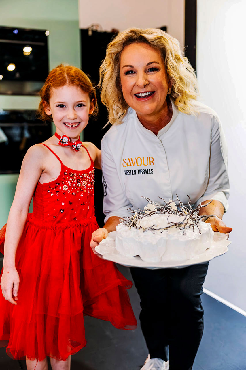 Kirsten Tibballs at The Festive Kitchen featuring The Great Australian Bake Off , enjoying the live performance at the Good Food & Wine Show christmas Edition